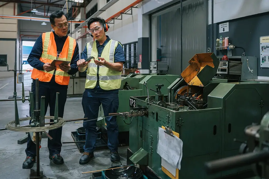 Technical Team Discussing Manufacturing Solution
